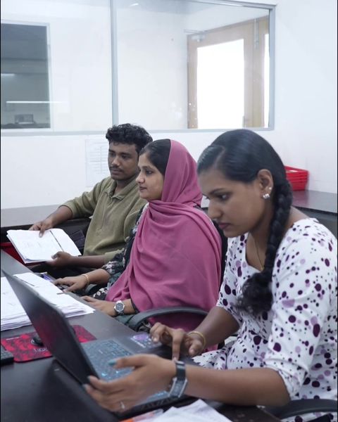 The Denco office team reviewing case paperwork